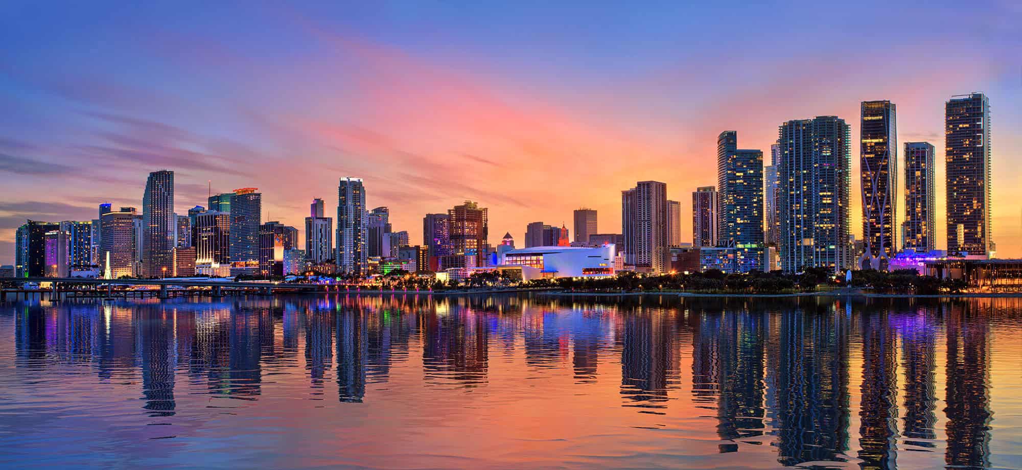 Miami skyline at night with neon lights